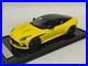 1_18_MotorHelix_Model_of_the_Aston_Martin_DB12_coupe_in_Yellow_01_hkmt