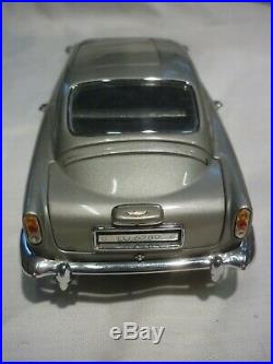 A Danbury mint of a scale model of James Bond's Aston Martin DB5, Goldfinger