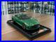 Aston_Martin_DB12_Coupe_MotorHelix_Iridescent_Emerald_Ltd_199pc_1_18_Resin_01_jyj