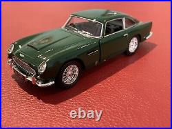 Aston Martin DB5 diecast car 1963 British Racing Green self propel 1/38 scale
