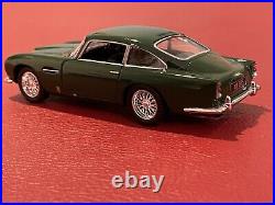 Aston Martin DB5 diecast car 1963 British Racing Green self propel 1/38 scale